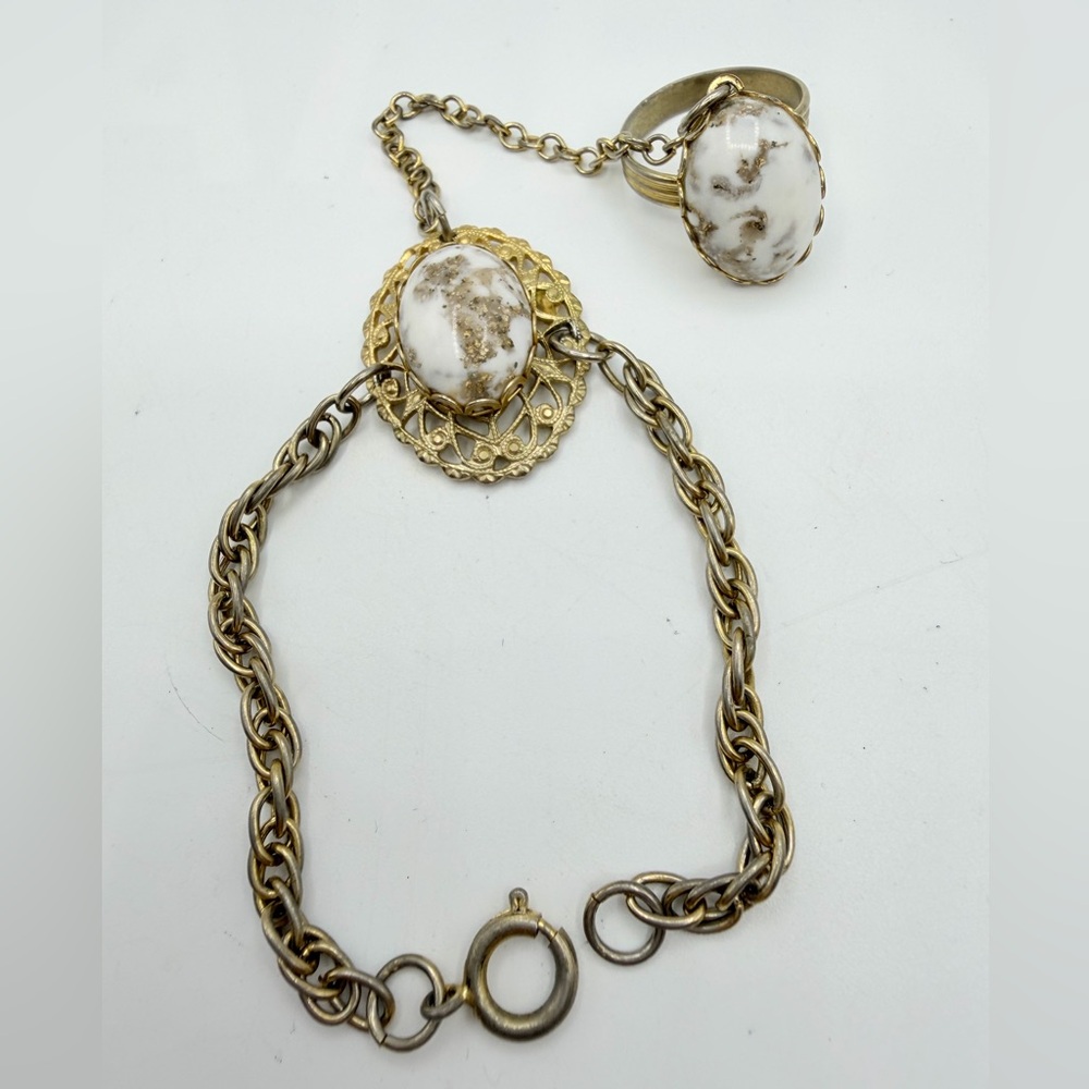 VTG gold-tone Egyptian style slave bracelet with an attached chain ring
